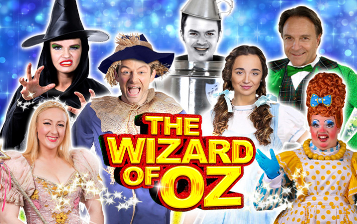 Poster showing the cast of the Wizard of Oz stage production showing things to do in the Cotswolds
